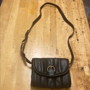 Chic Black and Gold Crossbody Bag with Adjustable Strap